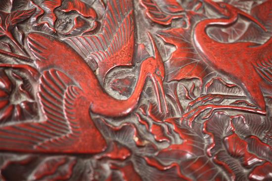 A Chinese red lacquer pentafoil shaped dish, width 28cm